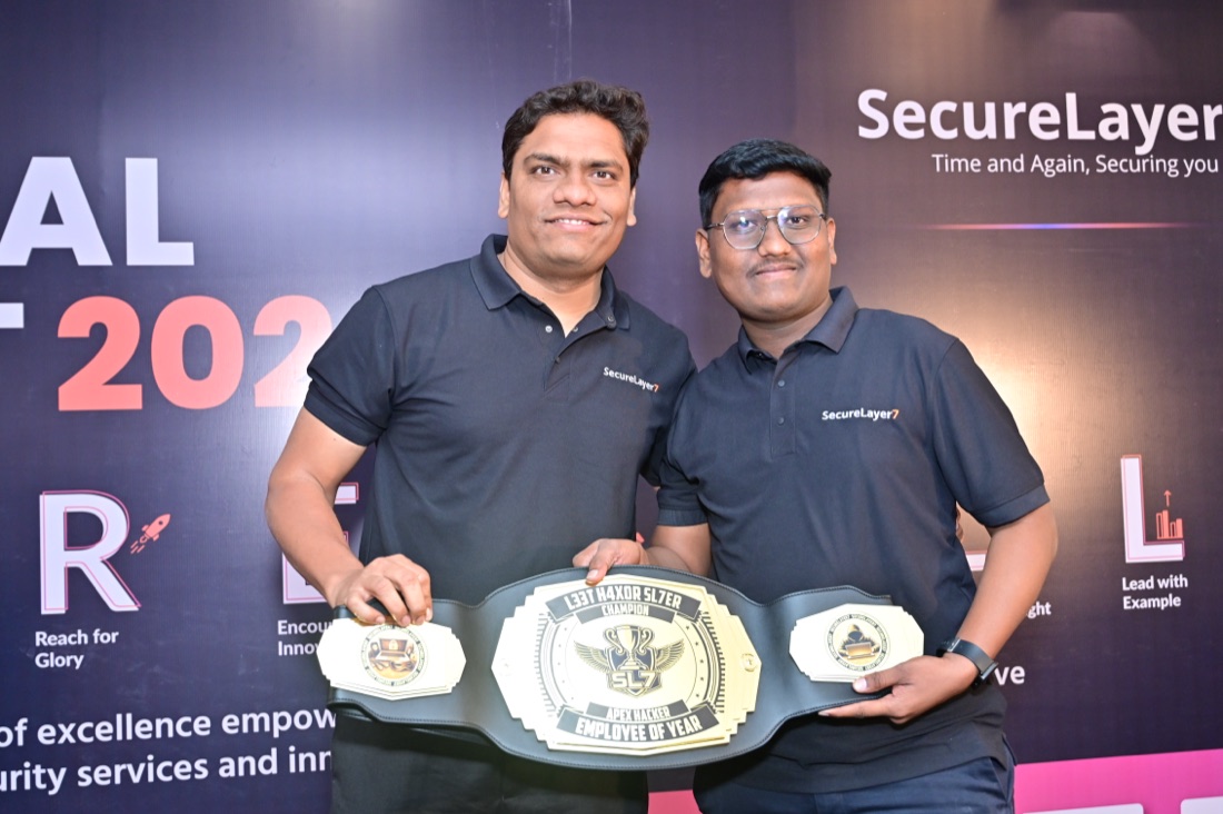 Pranav Khune with SecureLayer7 founder holding the Employee of the Year belt